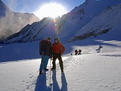 10 1 First Rays Of Morning Sun Hit Climbing Sherpa Palde and Jerome Ryan Trekking On Glacier Towards East Col Although we were on the move an hour before sunrise at 5am, the other tour group had already left camp even earlier. I quickly fell into my trekking rhythm climbing on the glacier, walking slowly but continuously, counting my steps, and passed the trekkers from the other group. Climbing Sherpa Palde and Jerome Ryan pause to enjoy the warmth of the first rays of the sun.